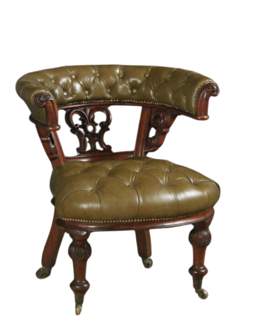 Antique Victorian leather wingback desk chair in sage-green leather