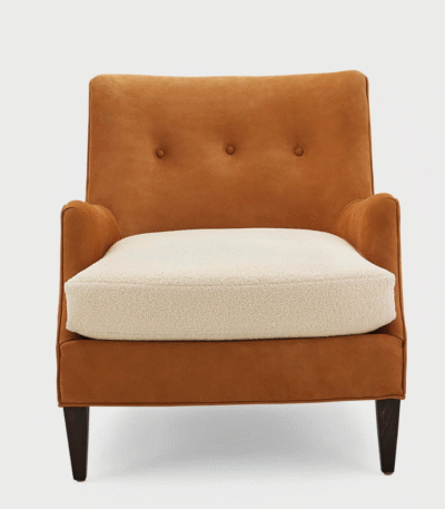 Cognac Charm Armchair – cognac-hued upholstered chair with button-tufted back and plush bouclé seat cushion
