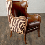 Zebra Monarch Armchair – carved teakwood frame with zebra-print full-grain leather