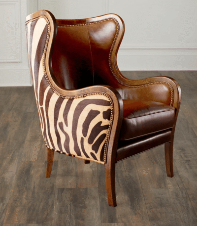 Zebra Monarch Armchair – carved teakwood frame with zebra-print full-grain leather