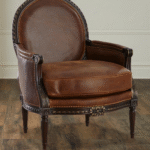 Rajput Royale Armchair – hand-carved teak frame with full-grain leather upholstery