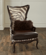 Teak Safari Armchair – solid teak frame with zebra-print leather and brass nailhead trim