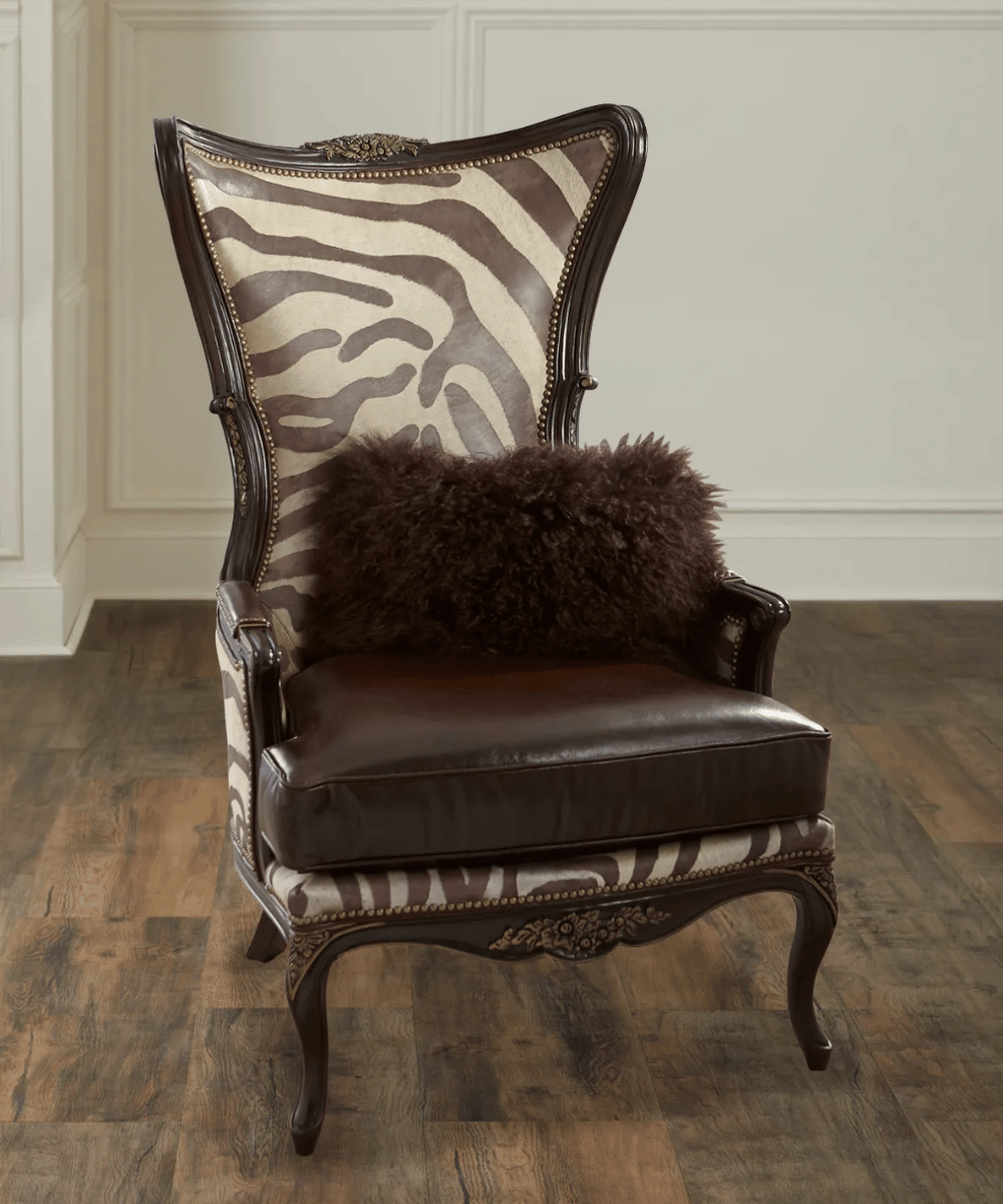 Teak Safari Teak Safari Armchair – solid teak frame with zebra-print leather and brass nailhead trim