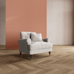 Grandeur Armchair – button-tufted upholstery with detailed teak wood legs